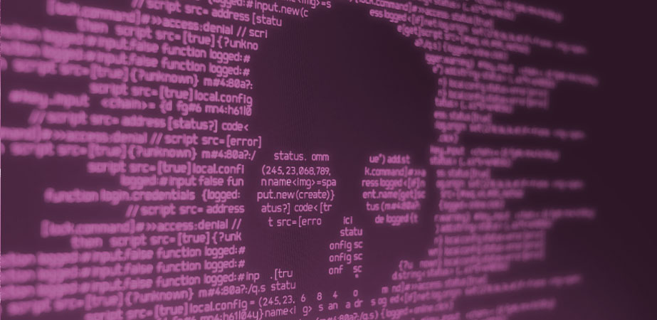 Totenkopf, umgeben von Computercodes auf einem Bildschirm, der Ransomware darstellen soll.